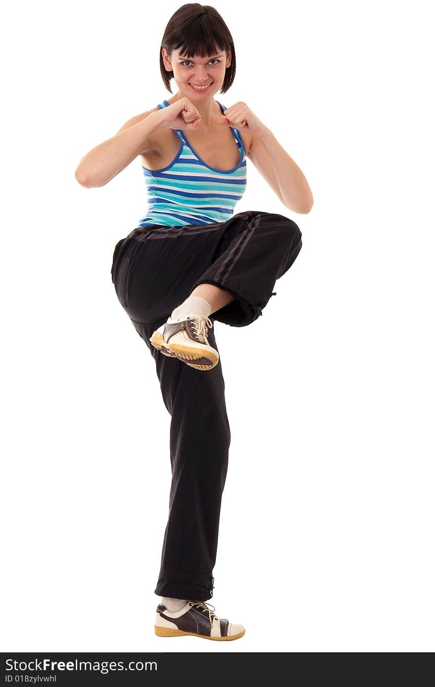 Karate. young woman isolated on white background.