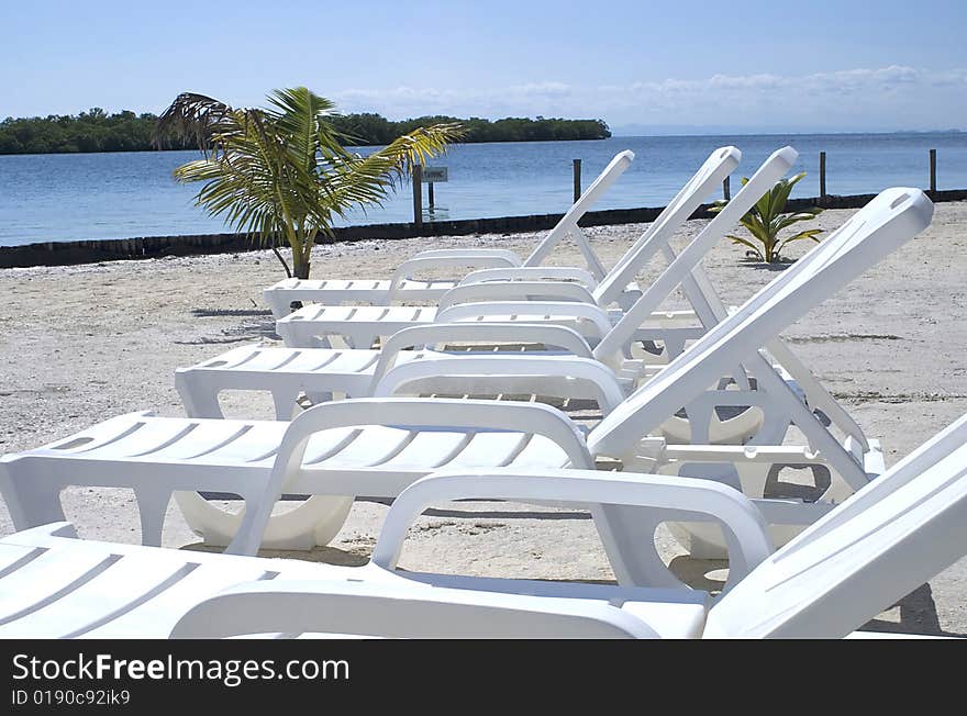 Chairs on the water.