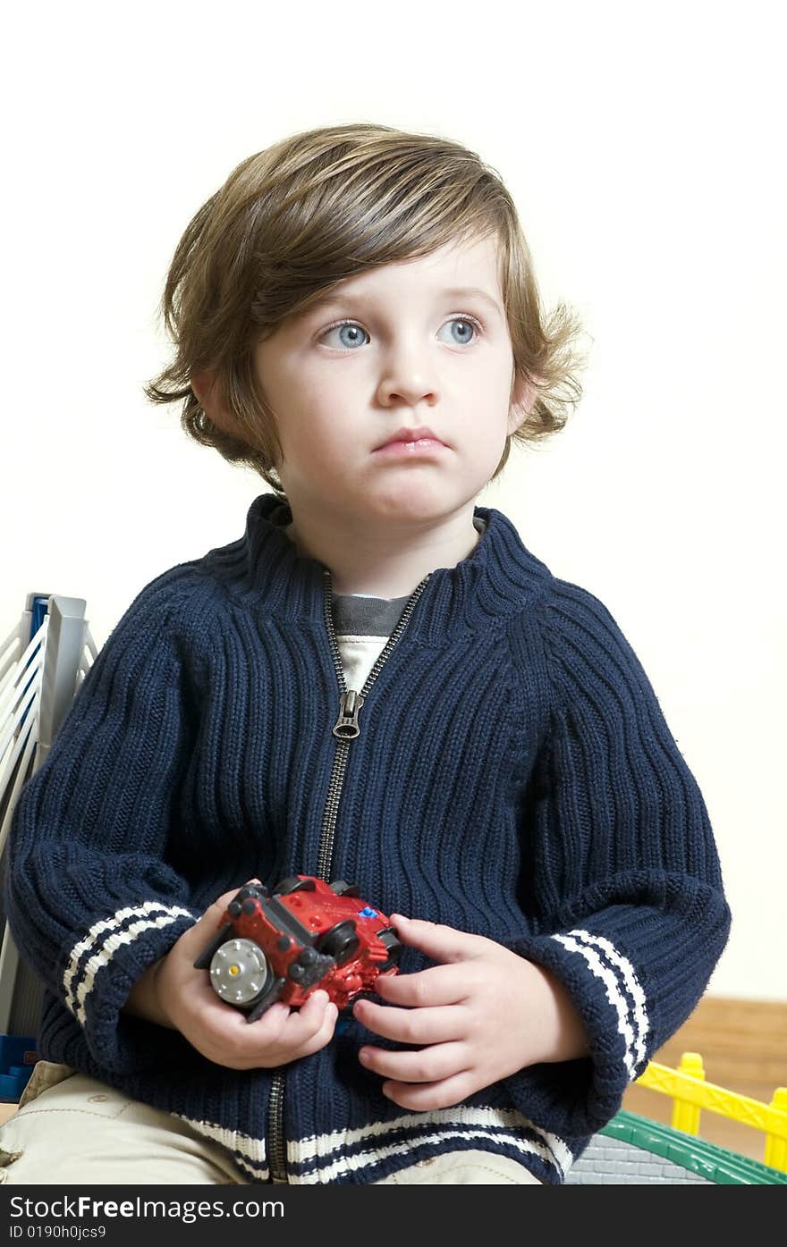 Portrait of little boy dreaming. Shallow DOF.