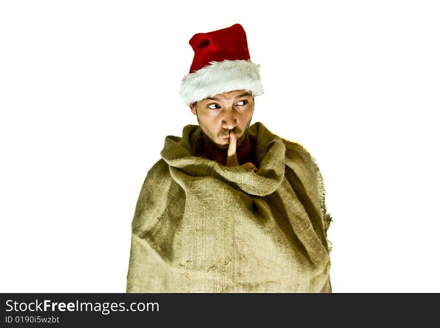 Man making christmas surprise standing in the santa bag. Man making christmas surprise standing in the santa bag