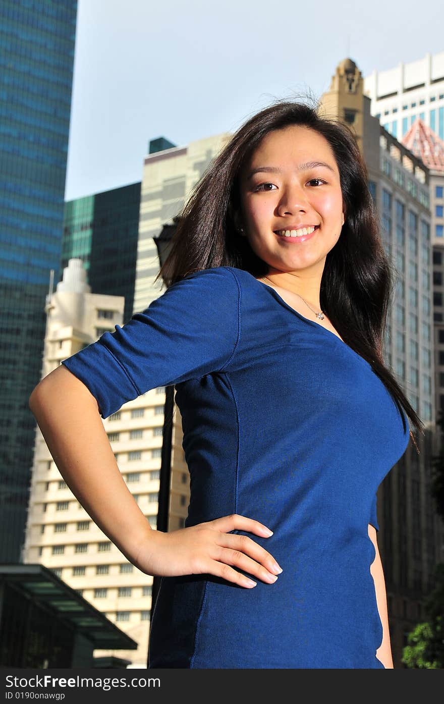 Asian Chinese Girl With Offices In The Background