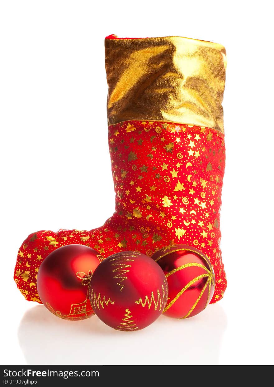 Christmas boot full with presents and three red balls. Christmas boot full with presents and three red balls