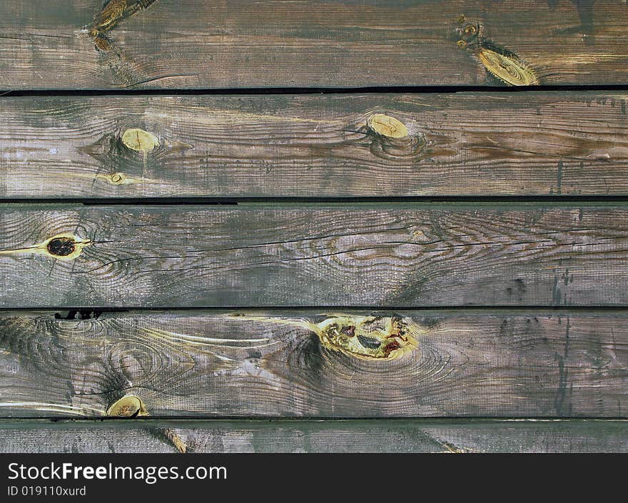 Old wooden wall with snags. Old wooden wall with snags