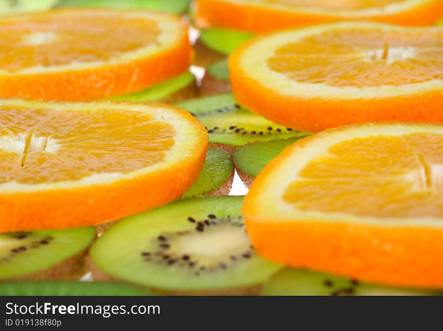 Orange and kiwi slices background