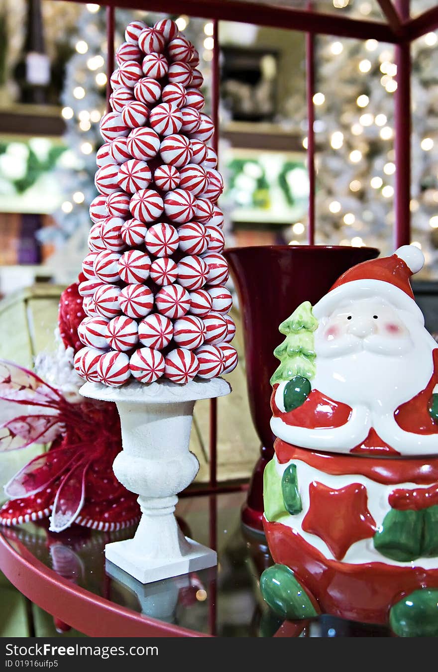 A peppermint candy tree and santa cookie jar. A peppermint candy tree and santa cookie jar.