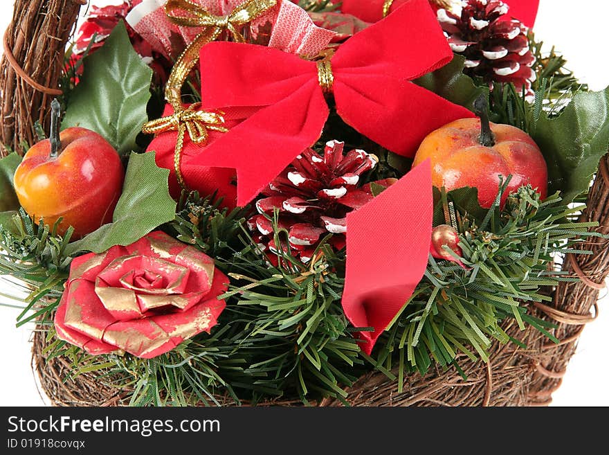 Close up of wicker with Christmas decoration on white. Close up of wicker with Christmas decoration on white