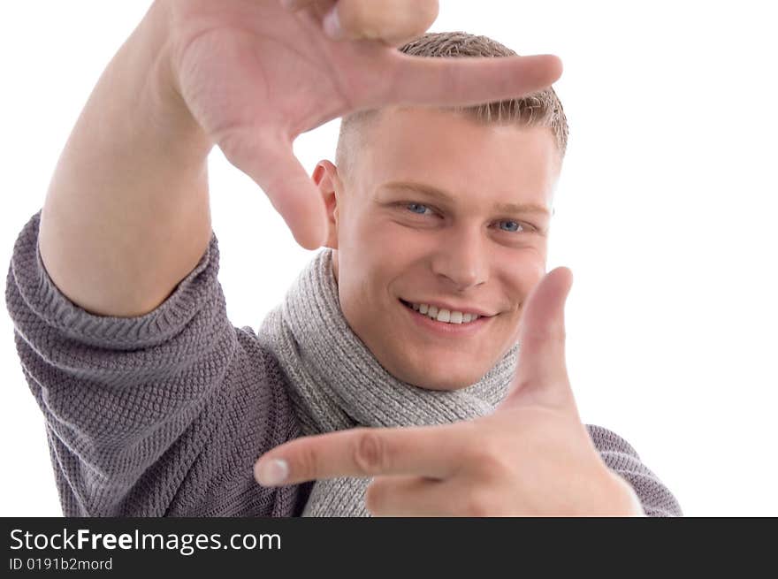 Young male showing directing hand gesture with white background