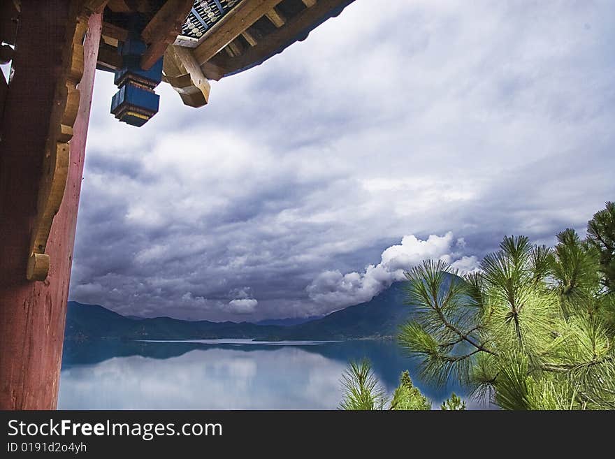 This is a picture of beautiful lake and chinese historic building. This is a picture of beautiful lake and chinese historic building