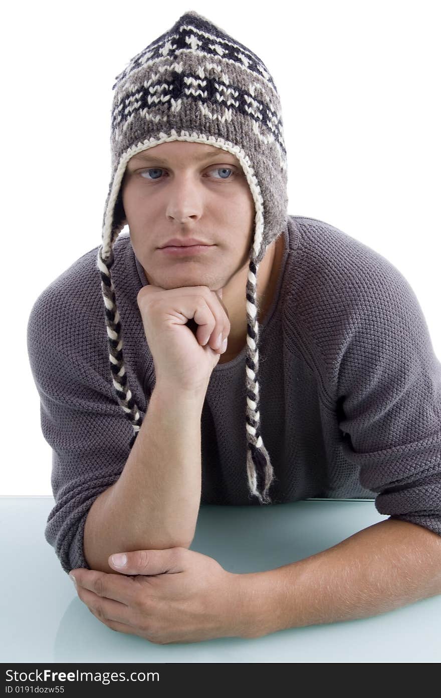 Adult man wearing winter cap on an isolated background