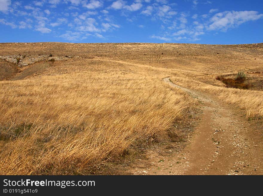 Road to Voloshin's hill. Autumn shot located Koktebel, Crimea, Ukraine. Road to Voloshin's hill. Autumn shot located Koktebel, Crimea, Ukraine