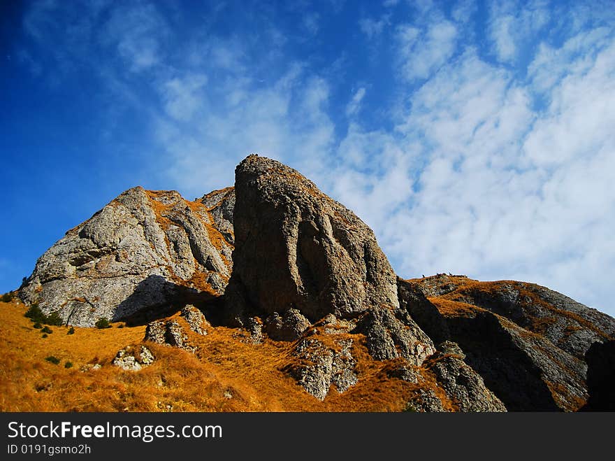 Beautiful rocks on a background of blue sky. Beautiful rocks on a background of blue sky