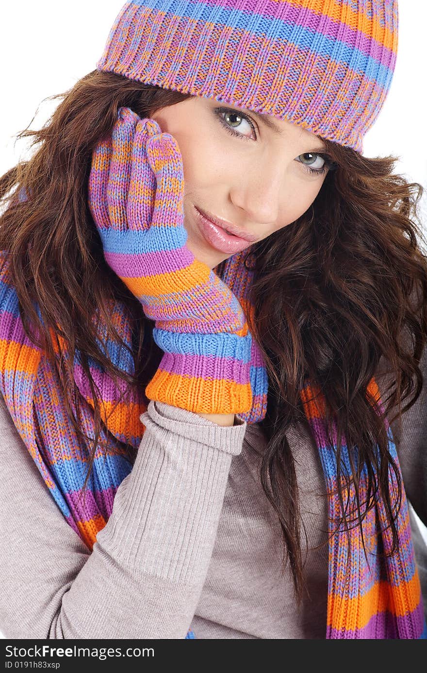 Portrait of winter girl wearing hat and gloves isolated on white background. winter fashion