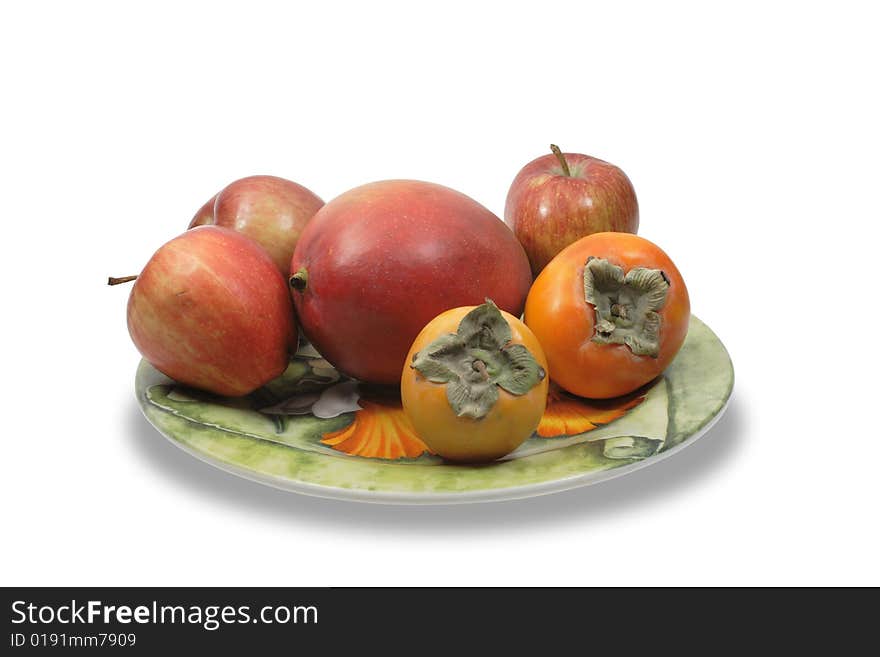 Isolated nice green plate with various fruits on white background. Isolated nice green plate with various fruits on white background