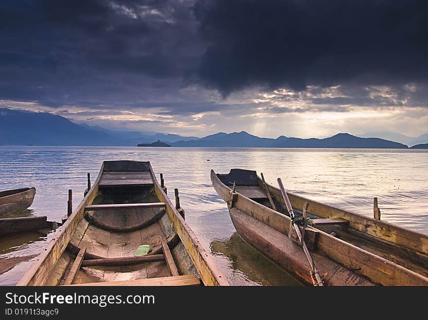 This is a picture of a very beautiful lake and a boat. This is a picture of a very beautiful lake and a boat