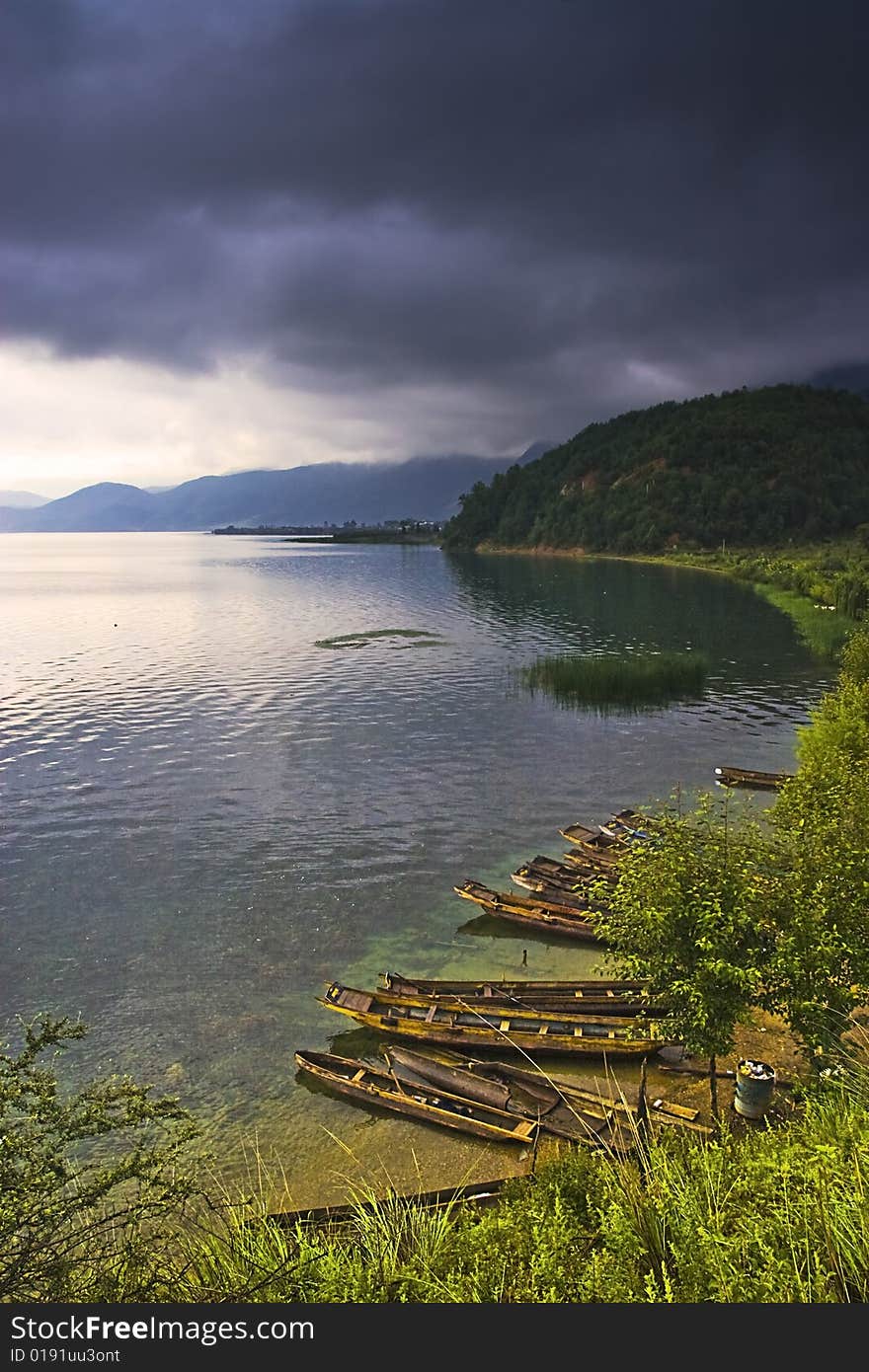 This is a picture of a very beautiful lake and a boat. This is a picture of a very beautiful lake and a boat