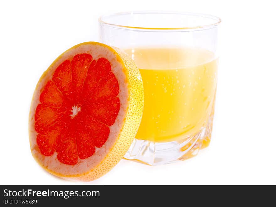 Slice of pink grapefruit and juice