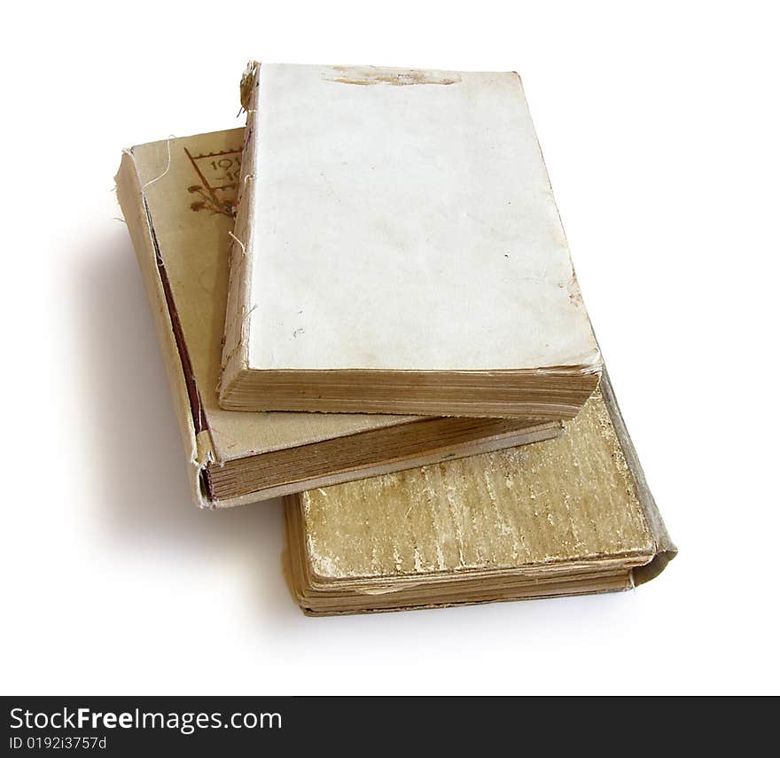 Three vintage books on white