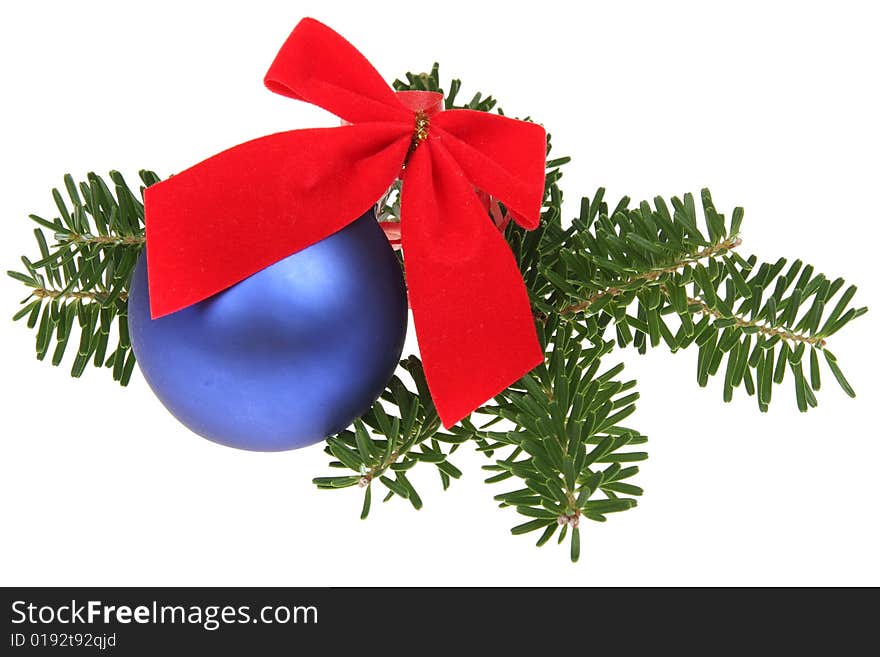 Christmas balls with ribbons and branch on white background