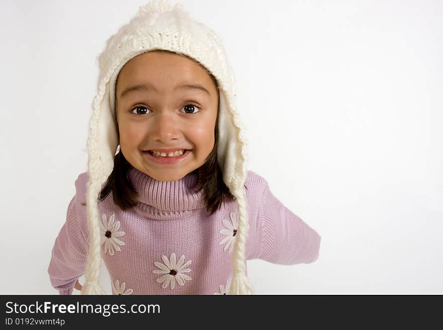 Smiling little girl on white background looking directly into camera. Smiling little girl on white background looking directly into camera