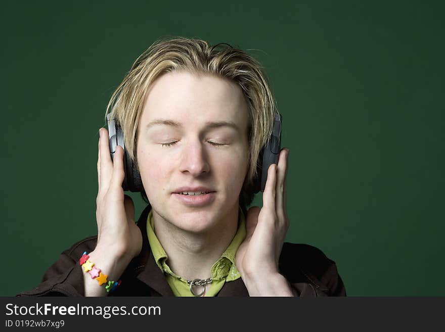 Caucasian man enjoying music with headphones