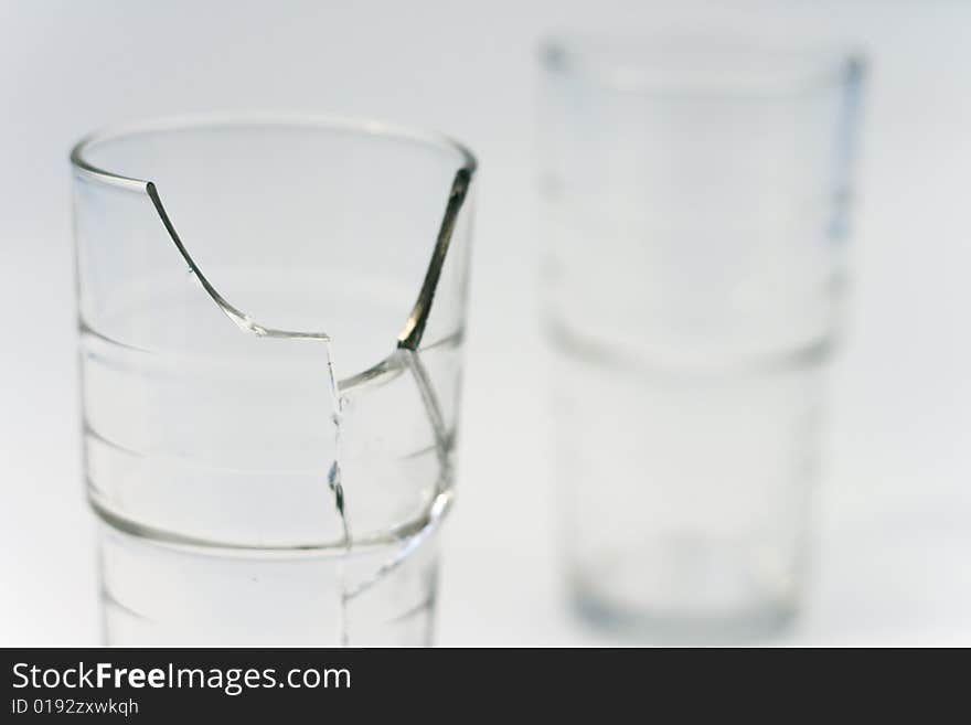 Broken glasses on white background. Broken glasses on white background