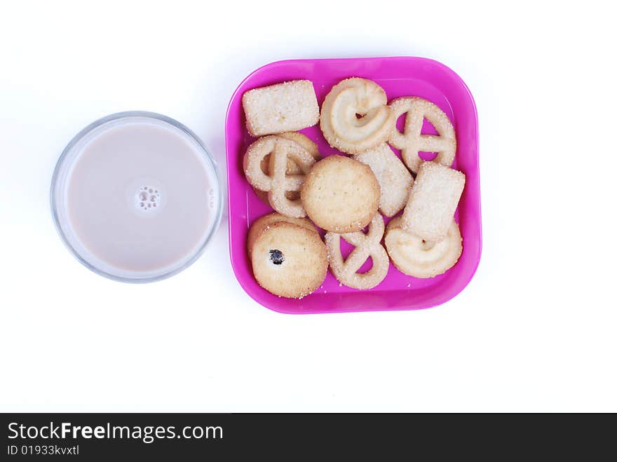 A plate of cookies and cup of milk-chocolate on white background. A plate of cookies and cup of milk-chocolate on white background