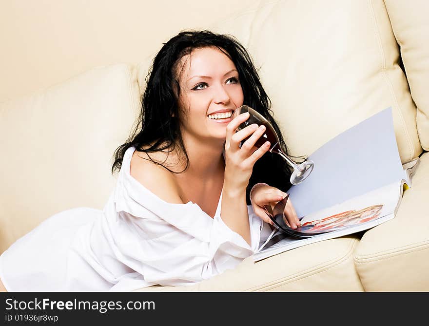 Beautiful Woman On The Sofa