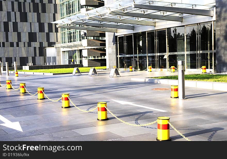 Sign of direction on the road, warning chain and arrow sign,lobby. Sign of direction on the road, warning chain and arrow sign,lobby