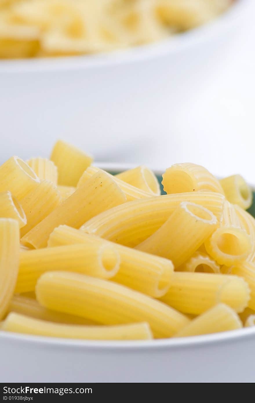 Fresh uncooked raw italian pasta isolated over white