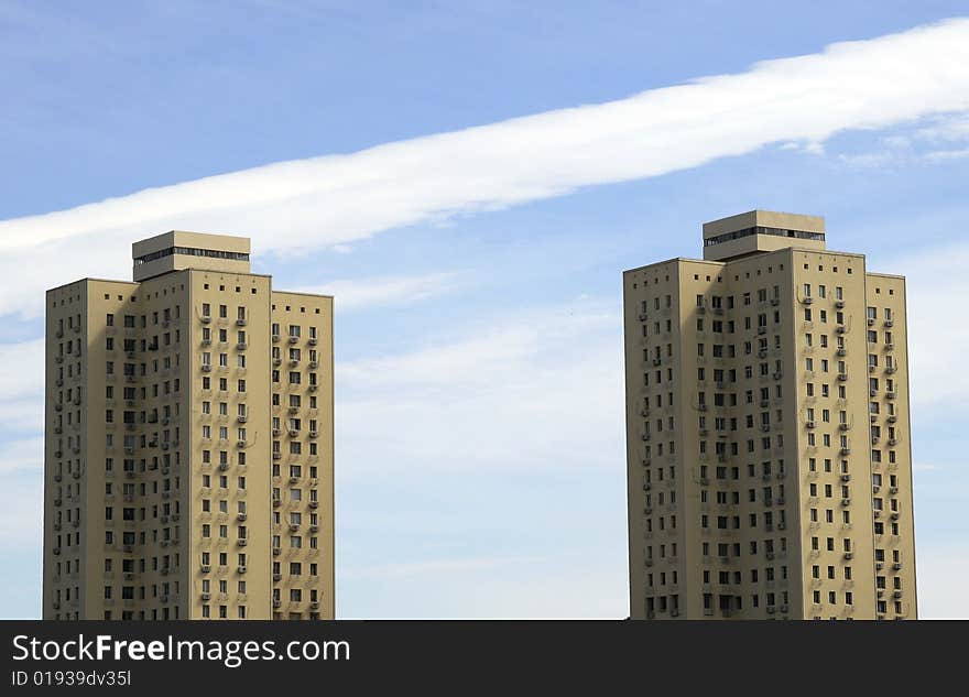 Residential building with cloudy sky