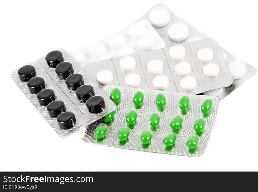 Several types of pills in their packages. Several types of pills in their packages