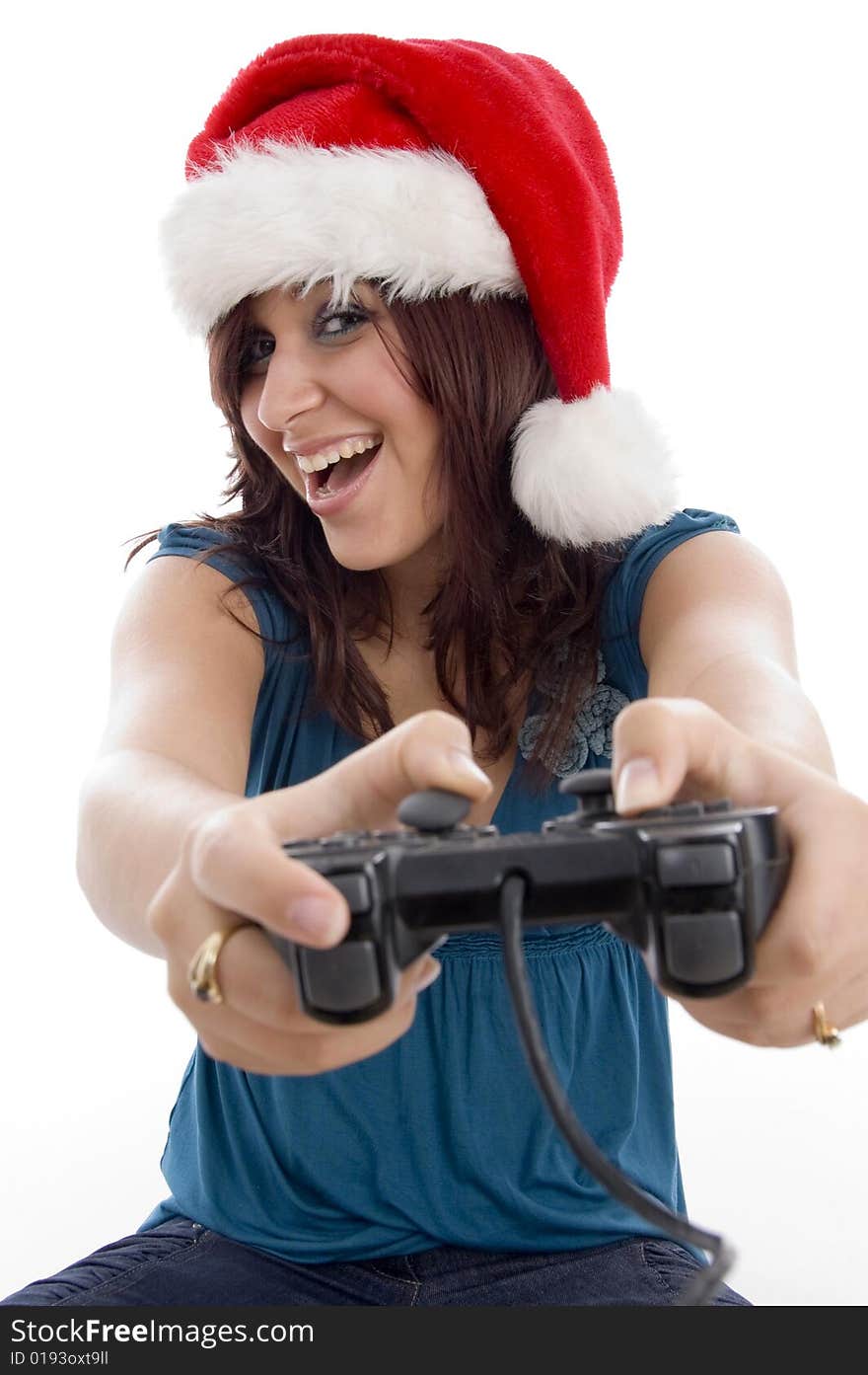 Brunette Female With Christmas Hat And Remote