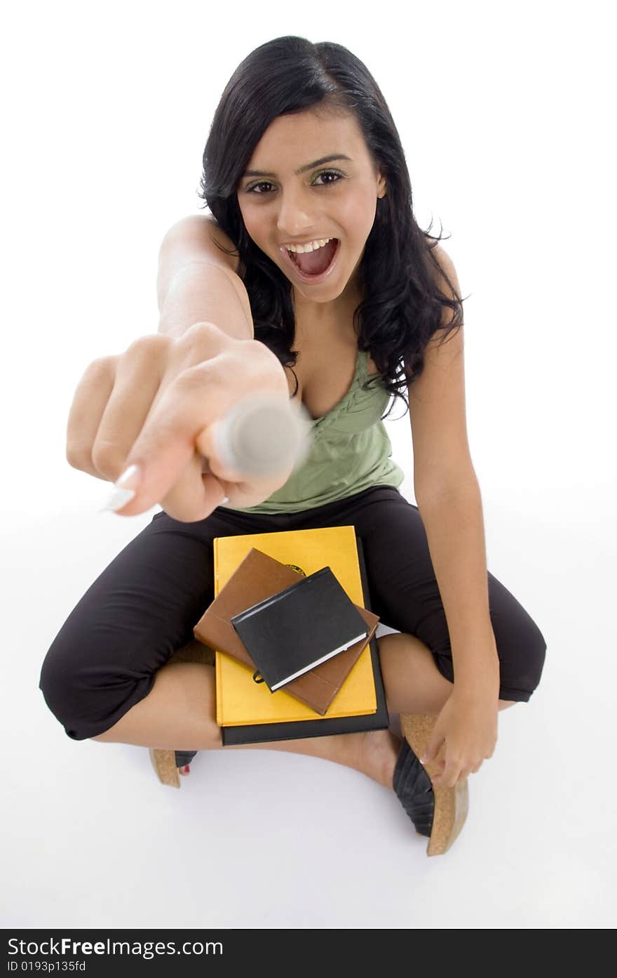 student holding pencil