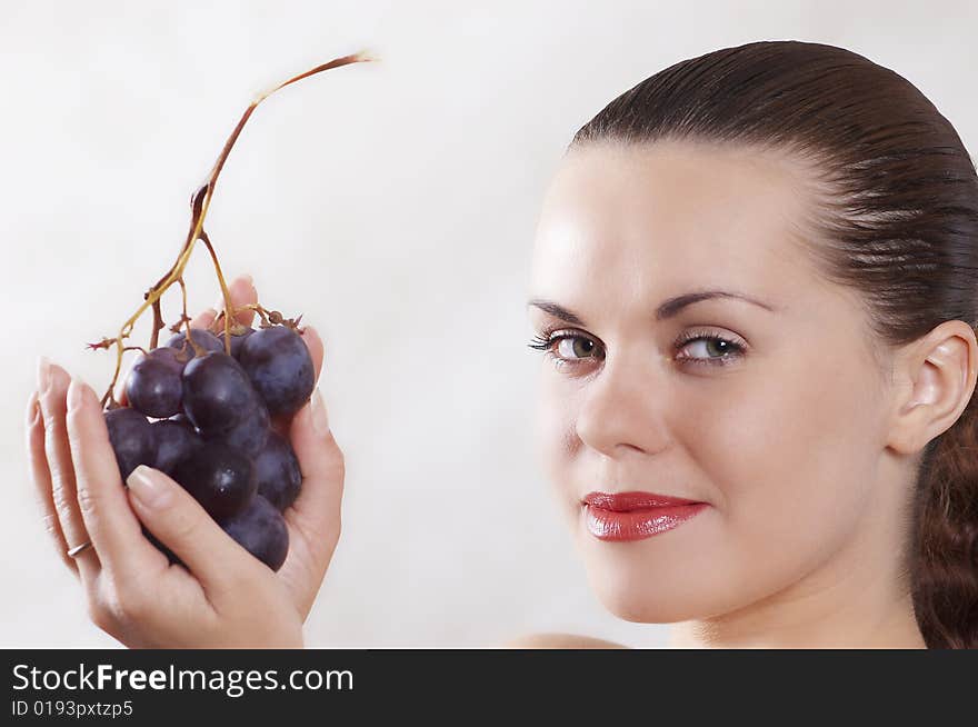 Beautiful girl and grape