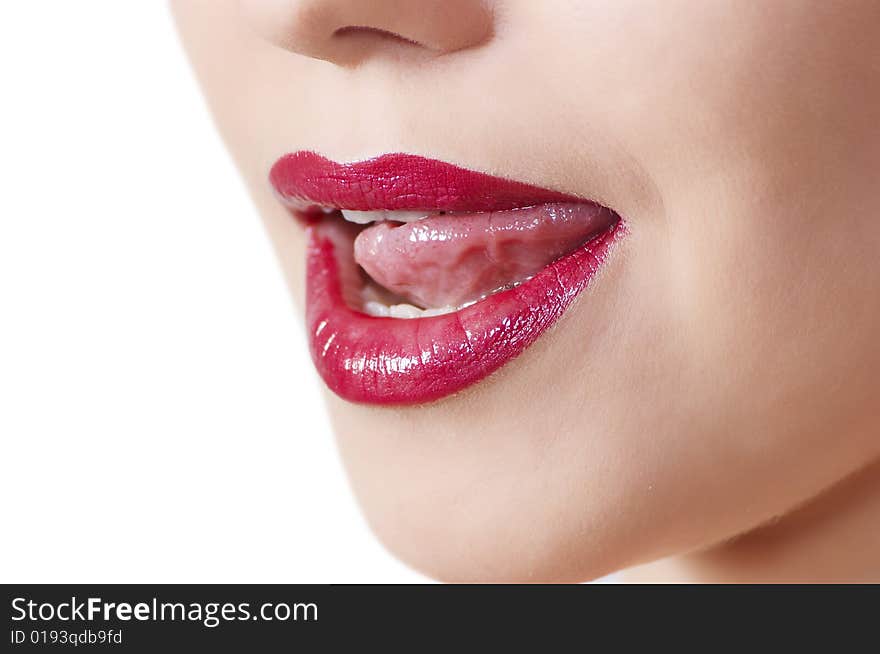 Beautiful woman leaking teeth with tongue close-up. Beautiful woman leaking teeth with tongue close-up