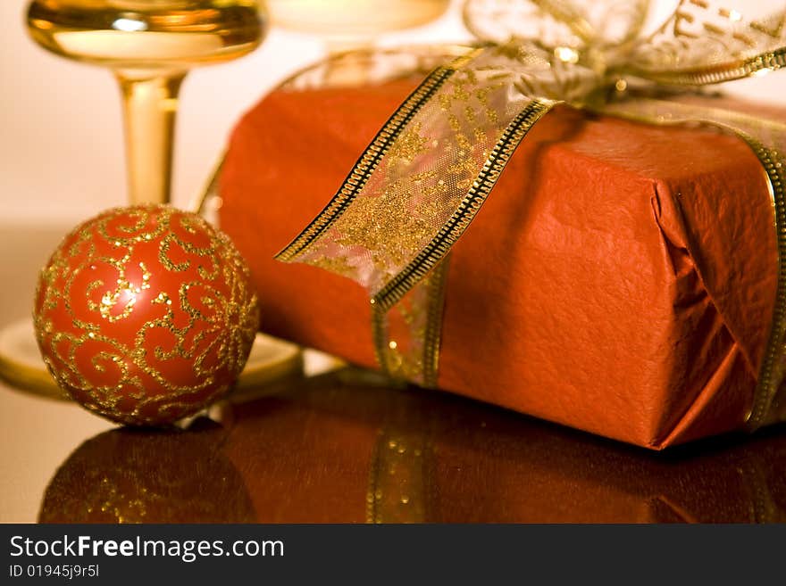 Christmas gifts and decoration on reflective background