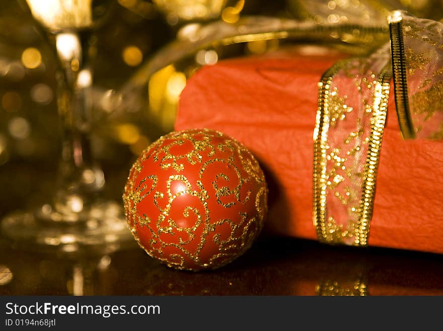 Christmas gifts and decoration on reflective background