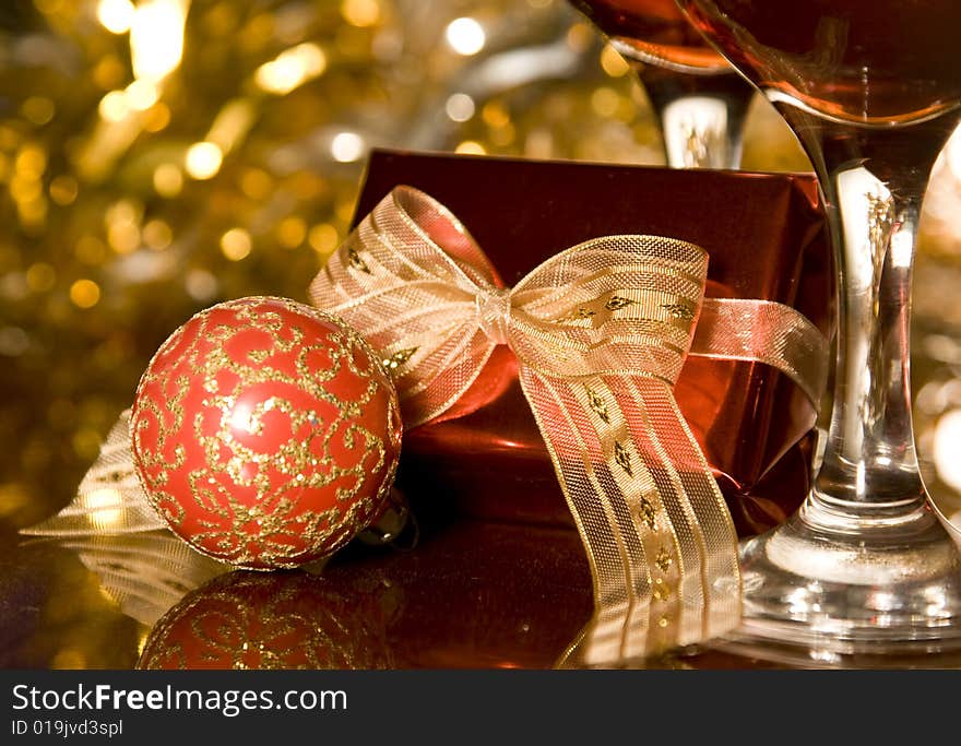 Christmas gifts decorations on reflecting background. Christmas gifts decorations on reflecting background