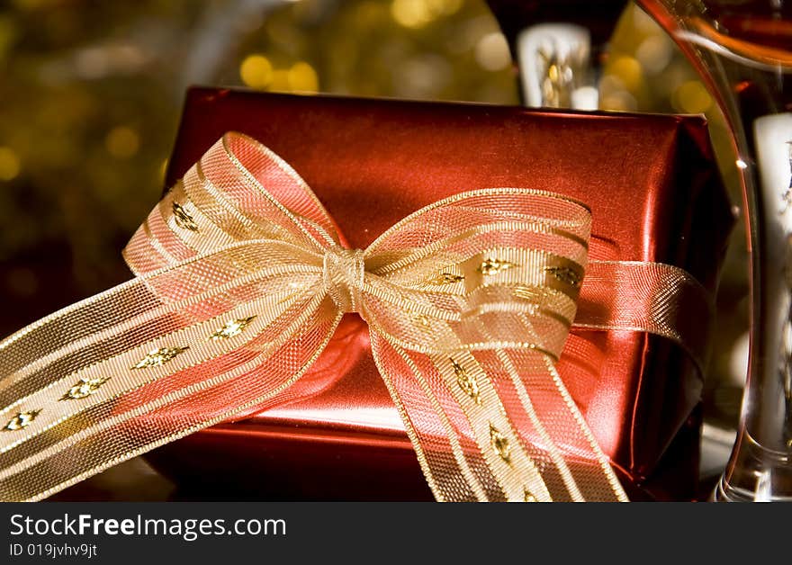 Christmas gifts decorations on reflecting background. Christmas gifts decorations on reflecting background