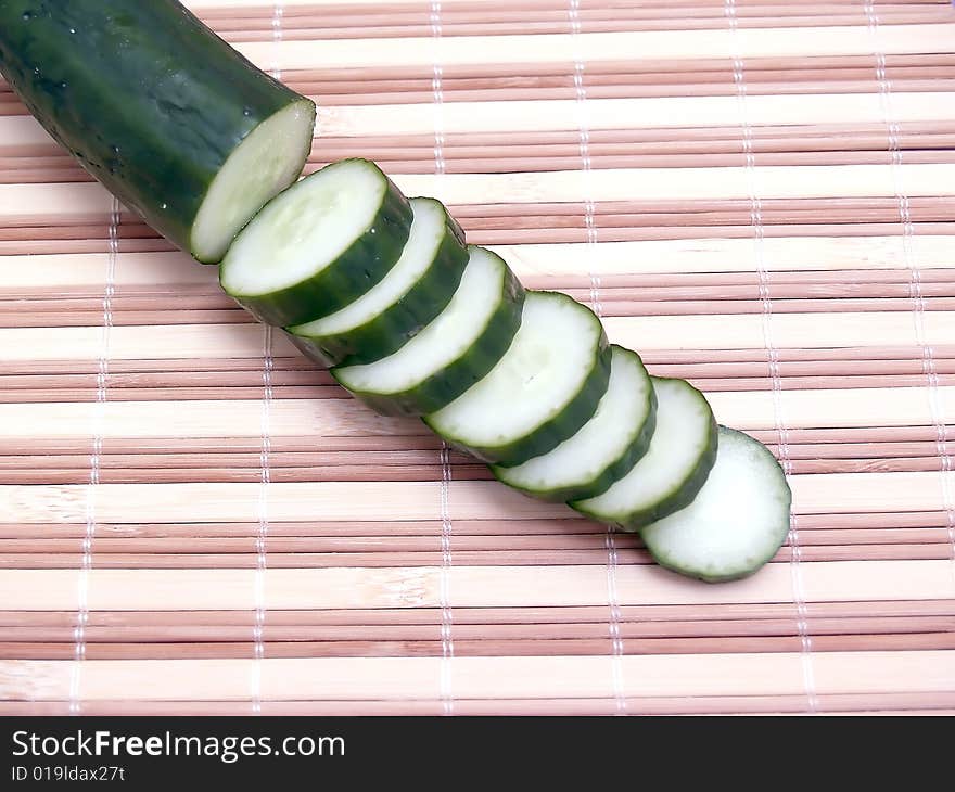 Cut cucumber slices, photography in the foreground