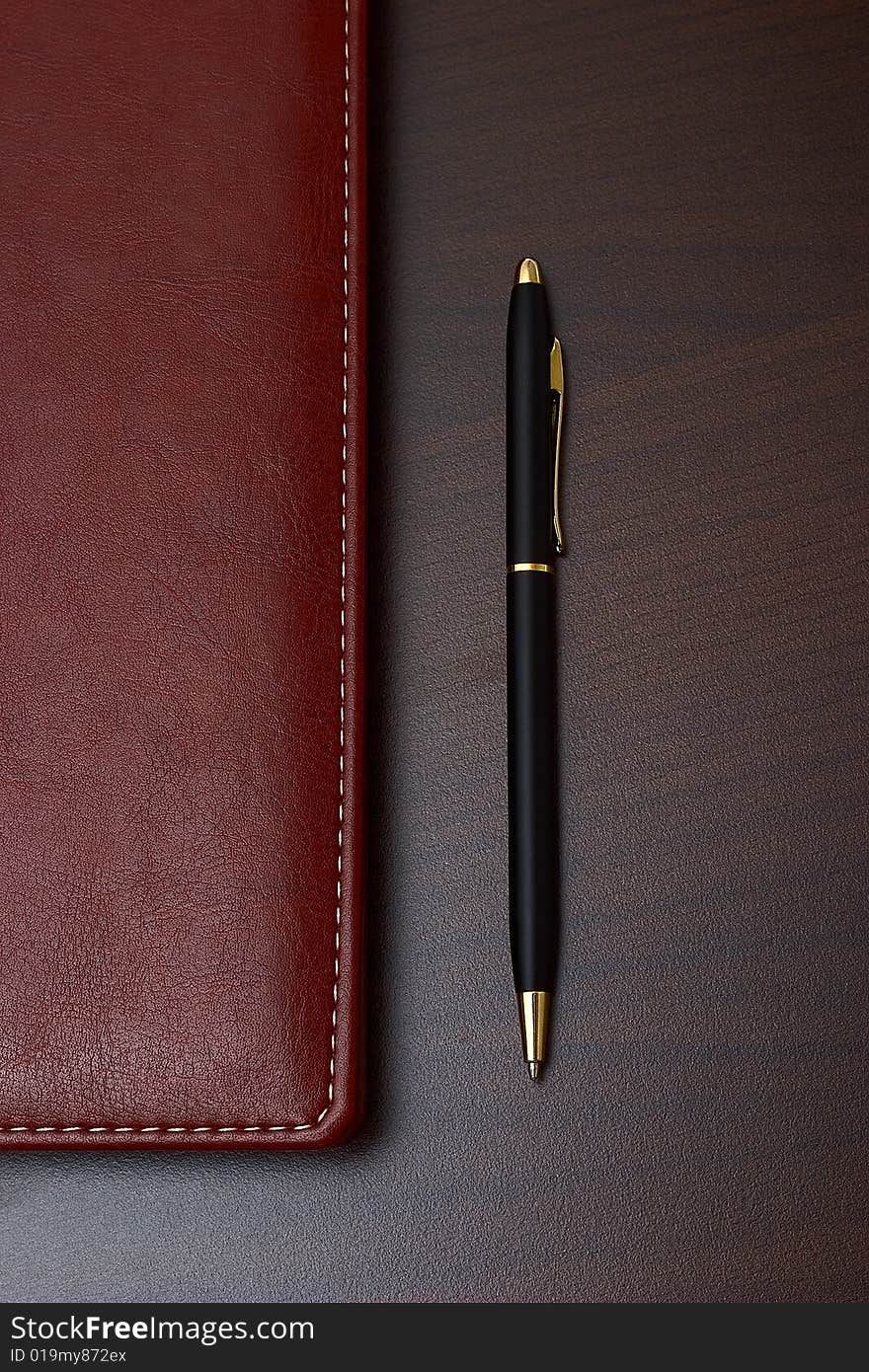 Business style: daily with leather cover and a black pen