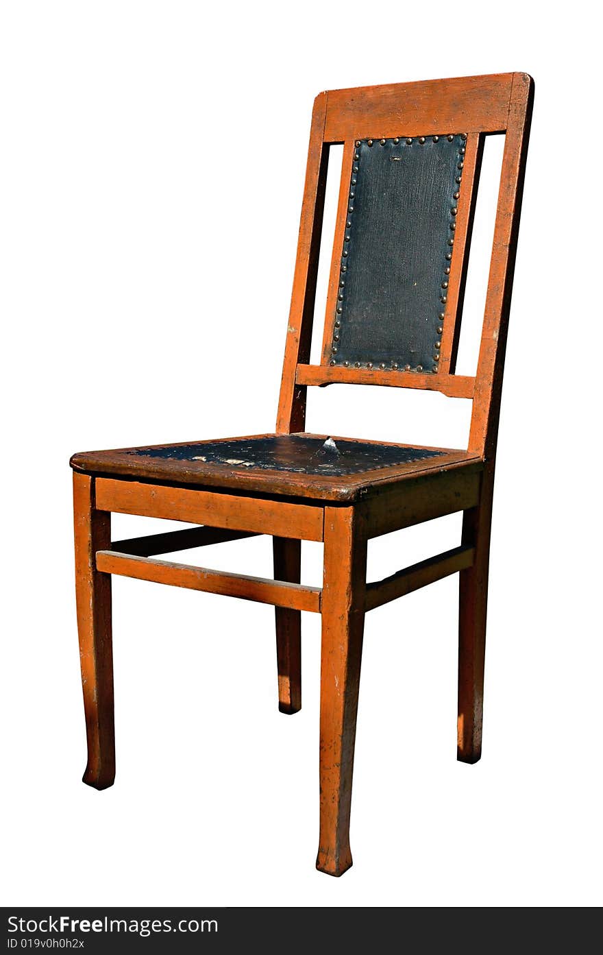 A view of an old chair upholstered by an oil cloth, isolated on a white background.