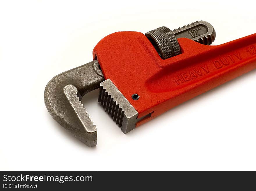 Professional tool - adjustable spanner. Isolated on white background. Studio lighting.