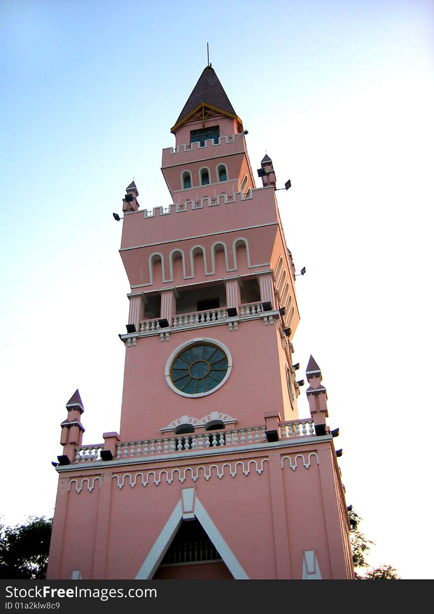 Wedding tower with stained-glass window in Harbin, China, evening view with backlit, pink light