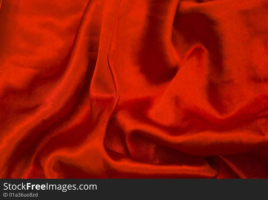 Abstract background of the red satin