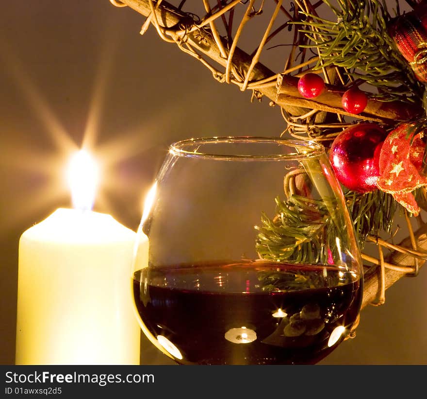 Christmas decoration with gift, wine and candles