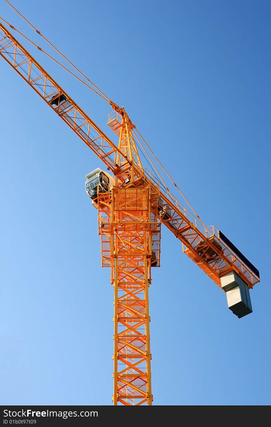 Yellow construction crane ground view