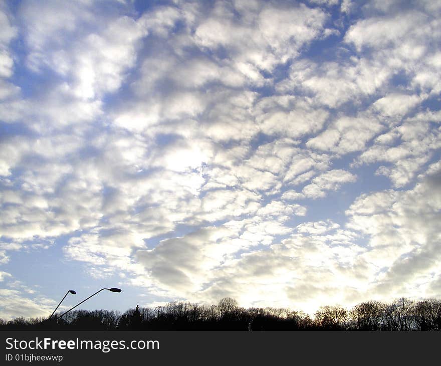 Sunny sky with clouds