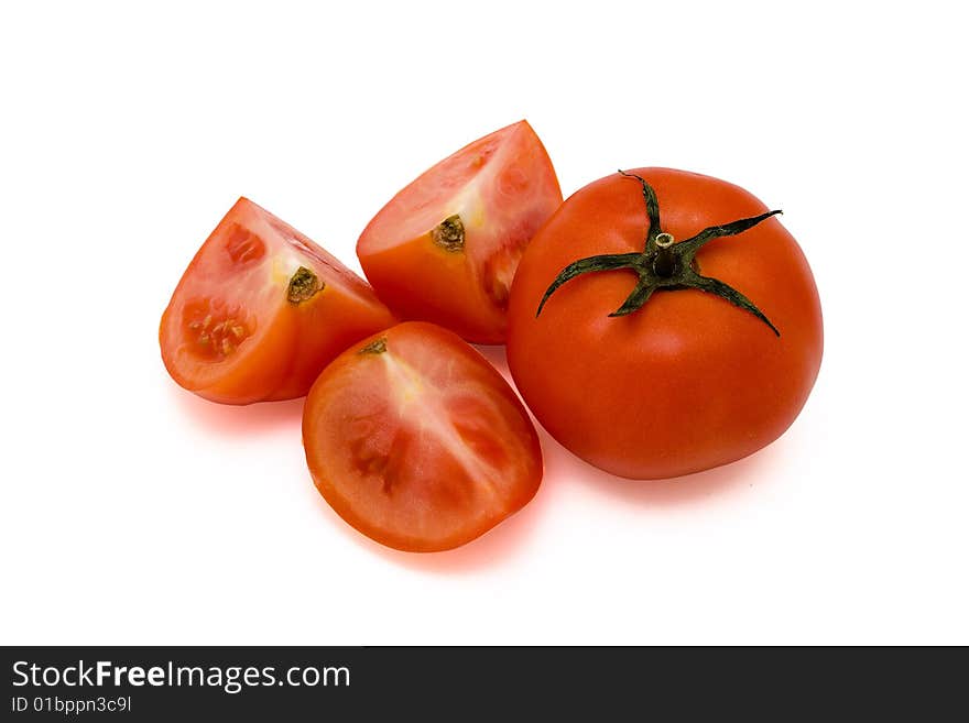 Red tomatoes isolated on white background. Studio light.