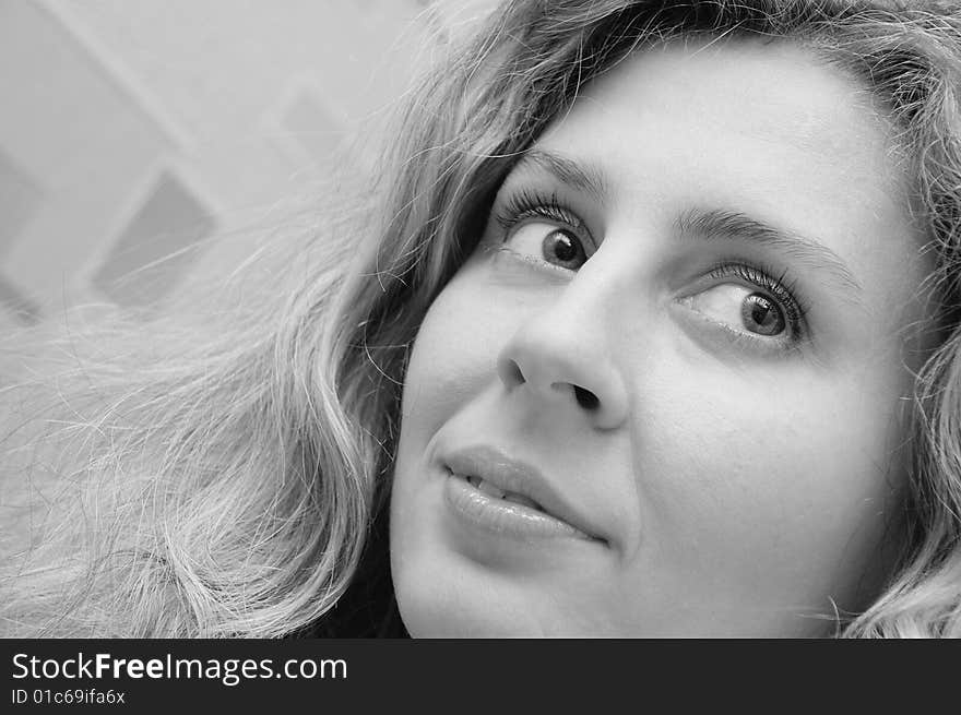 Close-up portrait of a beautiful young woman. Greyscale. Close-up portrait of a beautiful young woman. Greyscale.